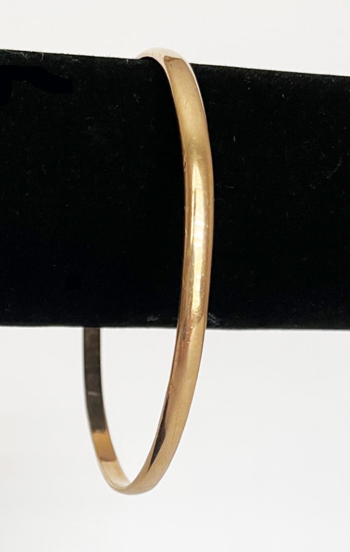 14K Gold Bangle: 14K gold bangle bracelet, 4mm wide x 7 1/2" circumference, 14.0 grams