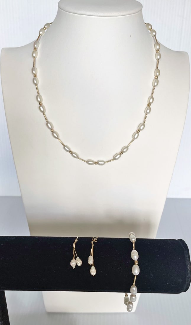 14K Gold and Freshwater Pearl Suite: 14K gold and freshwater pearl suite includes 17" necklace, 7" bracelet, both stamped 14K with maker's stamp, and a pair of 20mm drop earrings, stamped 14K on back, one back missing, 15.4 grams total w