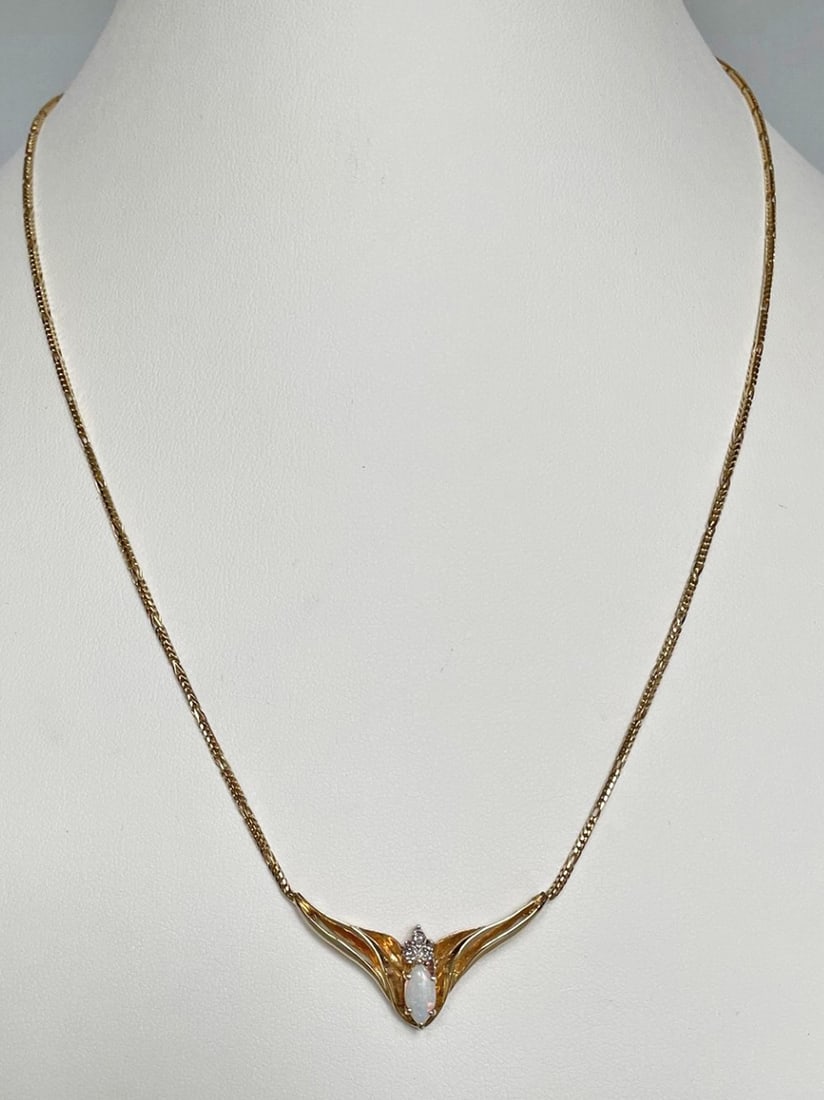 10K and 14K Gold Necklace with Opal and Diamonds: 10K and 14K Gold Necklace with opal and diamonds, chain stamped 14K Italy, attached pendant with opal and diamonds stamped 10kp (plumb), 18 1/2", 6.9 grams t. w.