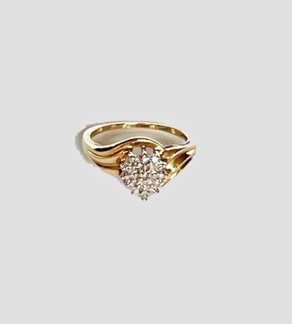 10K Gold and Diamond Ring: 10K yellow/white gold and diamond accent ring, stamped 10K with maker's stamp, 2.7 grams total weight, size 7