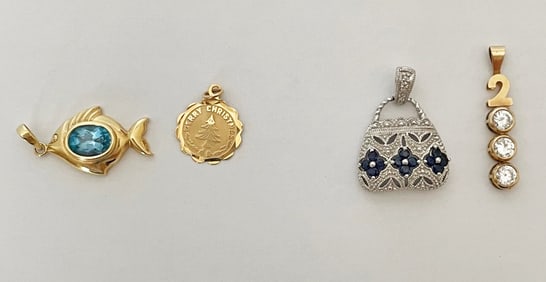 Four Gold Pendants/Charms