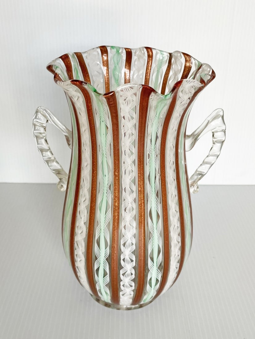 Murano Latticino Handled Vase: Murano Latticino handled vase, applied clear handles, pontil mark on bottom, 9" high x 5 1/4" across