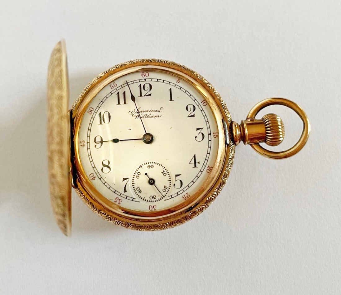 Hunter 14k Gold Pocket Watch by American Waltham: Hunter cased 14k gold pocket watch by American Waltham, initialed M on case, Arabic numerals with second hand dial, stamped 841042, Warranted 14K U.S. Assay, American Waltham Watch Co. on works, 35mm 