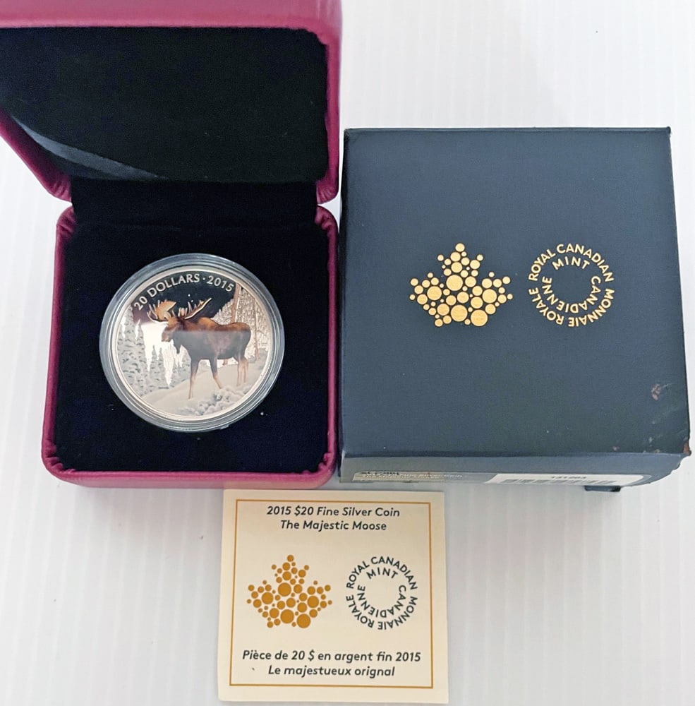 2015 $20 Fine Silver Coin. The Majestic Moose: $20 coloured coin. 99.99% pure silver. 31.39 grams. In fitted box with box and COA. Limited mintage. Royal Canadian Mint.