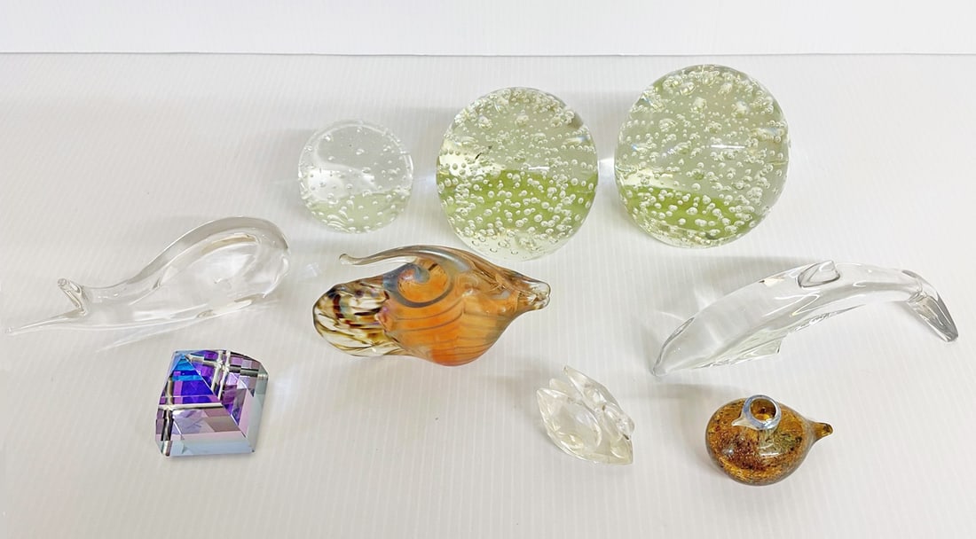 Glass Animal Figures and Paperweight Grouping: Nine piece glass animal figures and paperweights grouping, circa mid 20th c. to late 20th c., Baccarat 2 1/2" (h) x 6 1/2" style 762541 Dolphin Playing, Kosta Boda 2" (h) x 5 1/2" style #98029 Jonah a