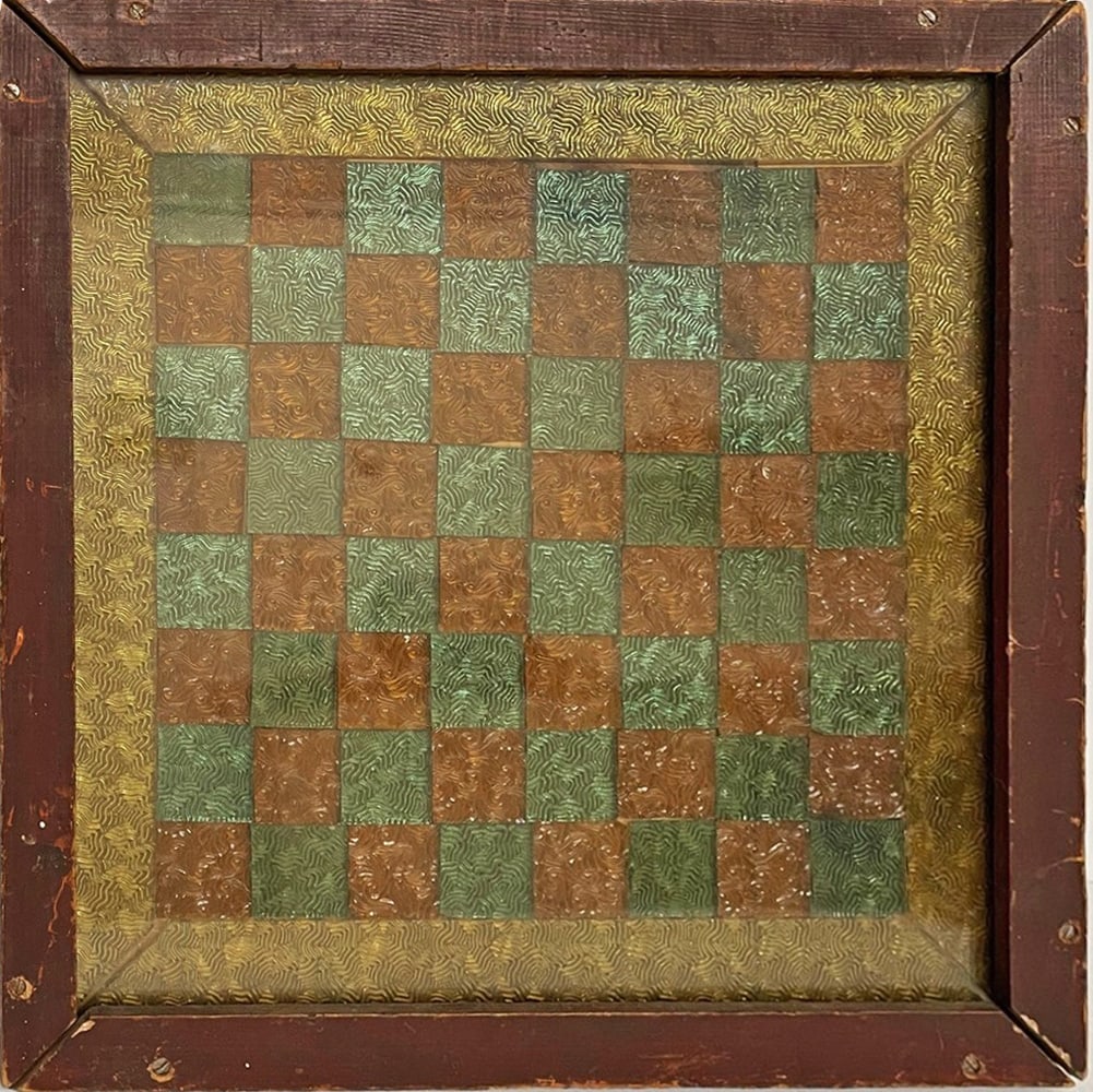 Antique Framed Glass Chess/Checkers Board: Antique framed glass chess/checkers board, amber and green glass squares with raised designs surrounded by yellow glass borders with raised designs, circa late 19th c. to early 20th c., 14 1/2" (h) x