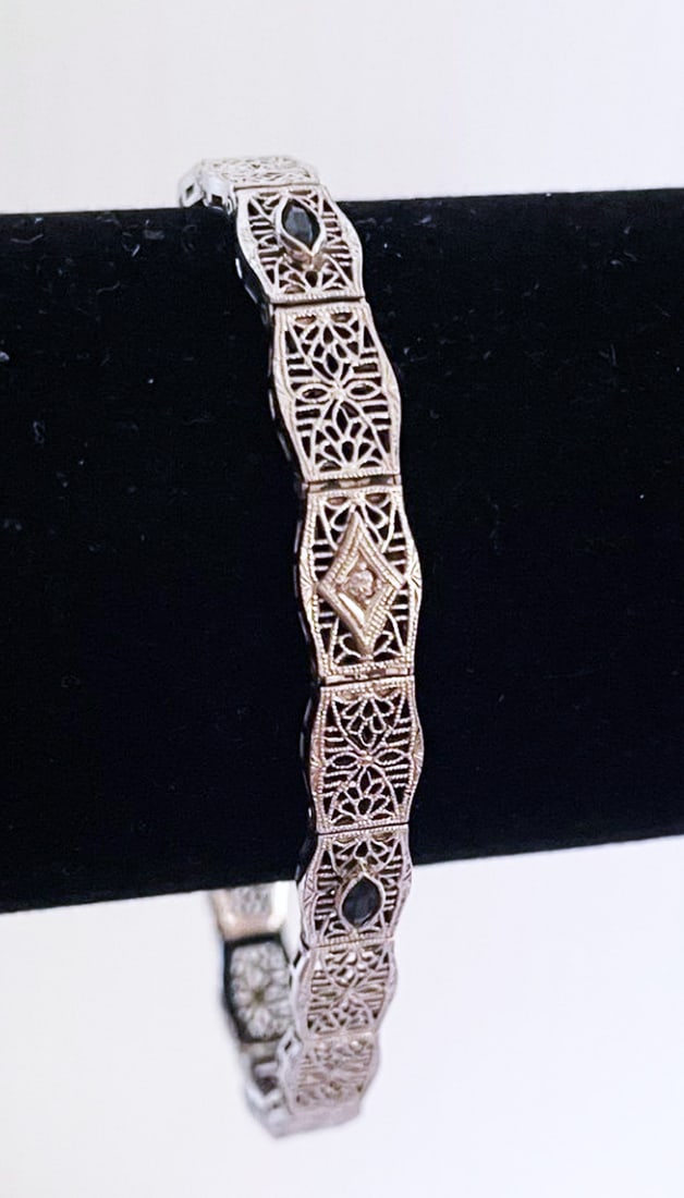 14K Gold Edwardian Bracelet: 14K gold Edwardian bracelet with center small diamond and two marquis shaped blue glass accents, 7", stamped 14k, 8.1 grams