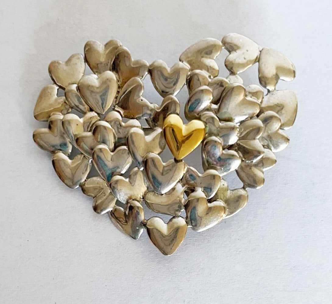 Movado Vintage Sterling Silver and 18k Gold Hearts Pin/Pendant: Movado vintage sterling silver and 18k gold hearts pin/pendant, artist signed (unknown signature), stamped 18K 1989 Movado 925, 1 3/4" x 1 1/2", 11.1 grams