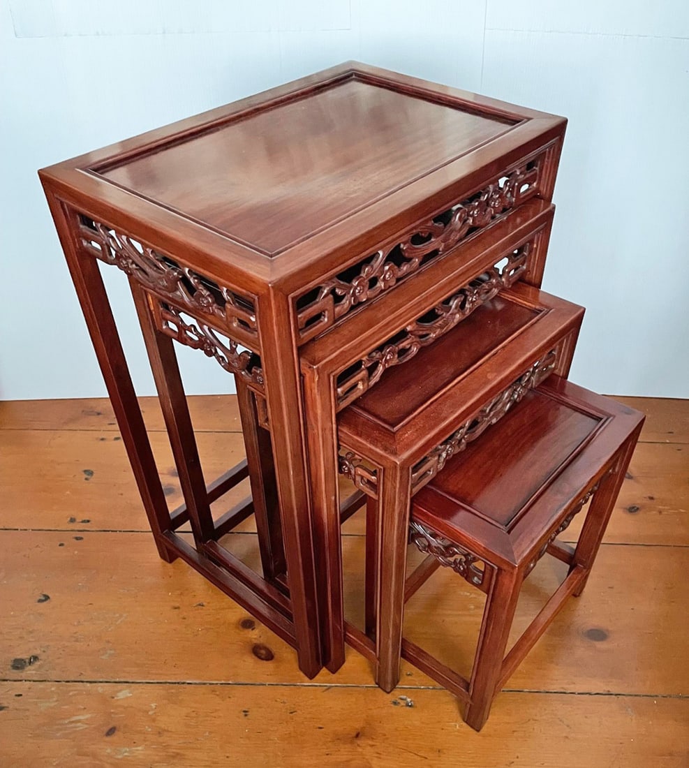 Asian Nest of Tables: Asian mahogany nest of tables, carved aprons, largest measures 26" x 20" x 14"
