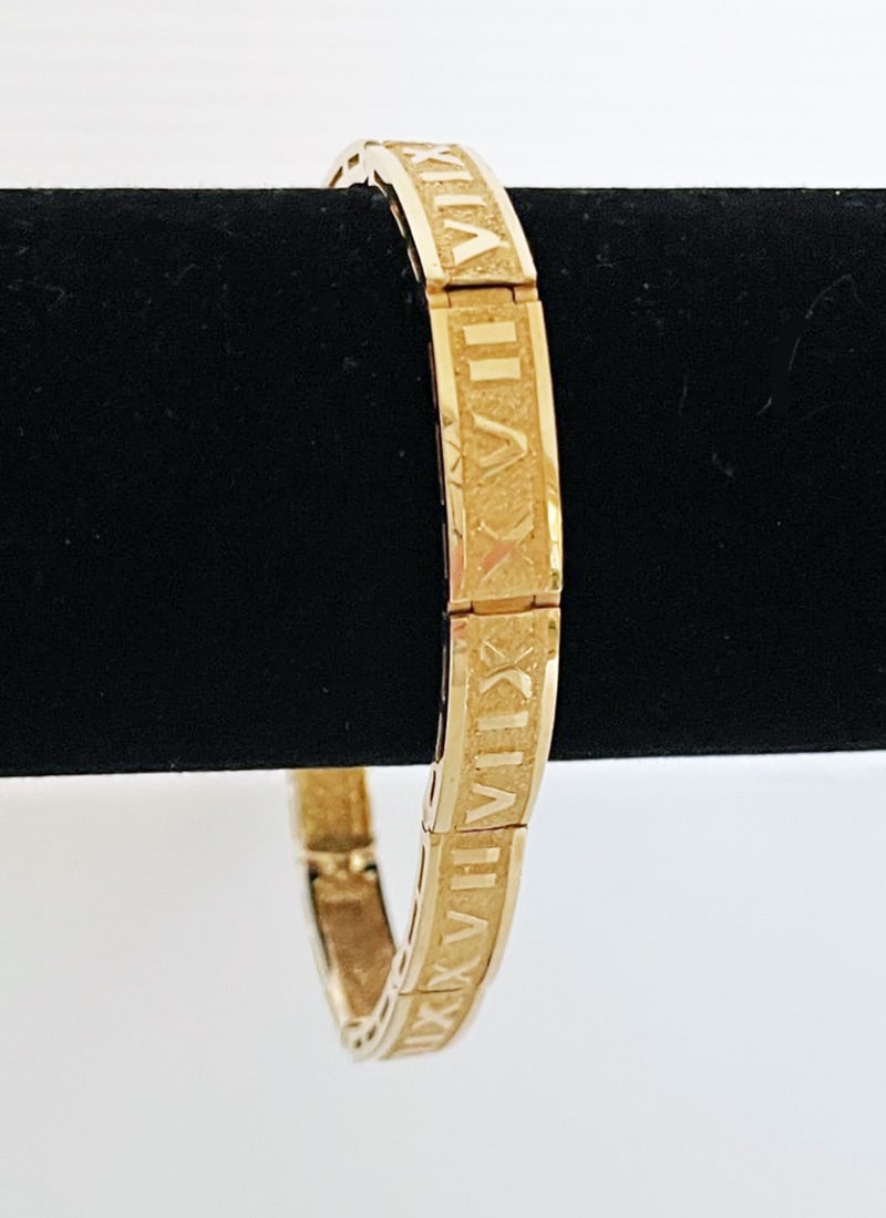 14k Gold Roman Numeral Bracelet: 14k gold Roman numeral bracelet, 7 1/4" long x 1/4" wide, stamped 14k, weight 9.8 grams
