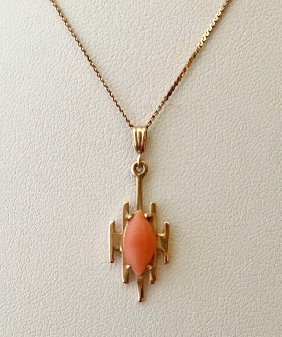 Italian 14k Gold Coral Pendant and Chain: Italian 14k gold coral pendant and chain, pendant measures 1" in length and is set with one navette shaped light color coral, stamped 14k, 16" chain stamped 14k Italy, weight 2.6 grams complete