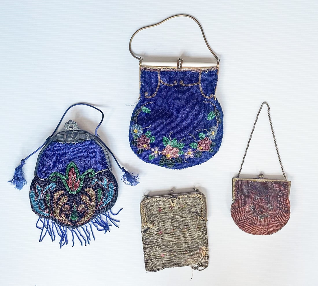 Lot of Four Vintage Beaded Handbags: Lot of four vintage beaded handbags, C. 1920 beaded purses include small amber color with brass frame, 4 1/2" long, chain handle with 5 1/2" drop, metal bead with brass frame, 4 1/2" long, 24" brass c