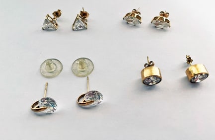 Four Pairs of 14k Gold C.Z. Earrings