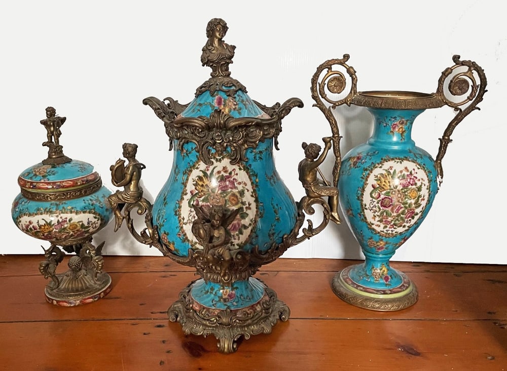 Three Wong Lee Urns with Bronze Mounts: Three Wong Lee urns with bronze mounts, French Rococo Revival style, two with lids, 21 1/2" high, vase 18" high, and smaller urn 14", late 20th C., designed in U.S. and produced in Macau