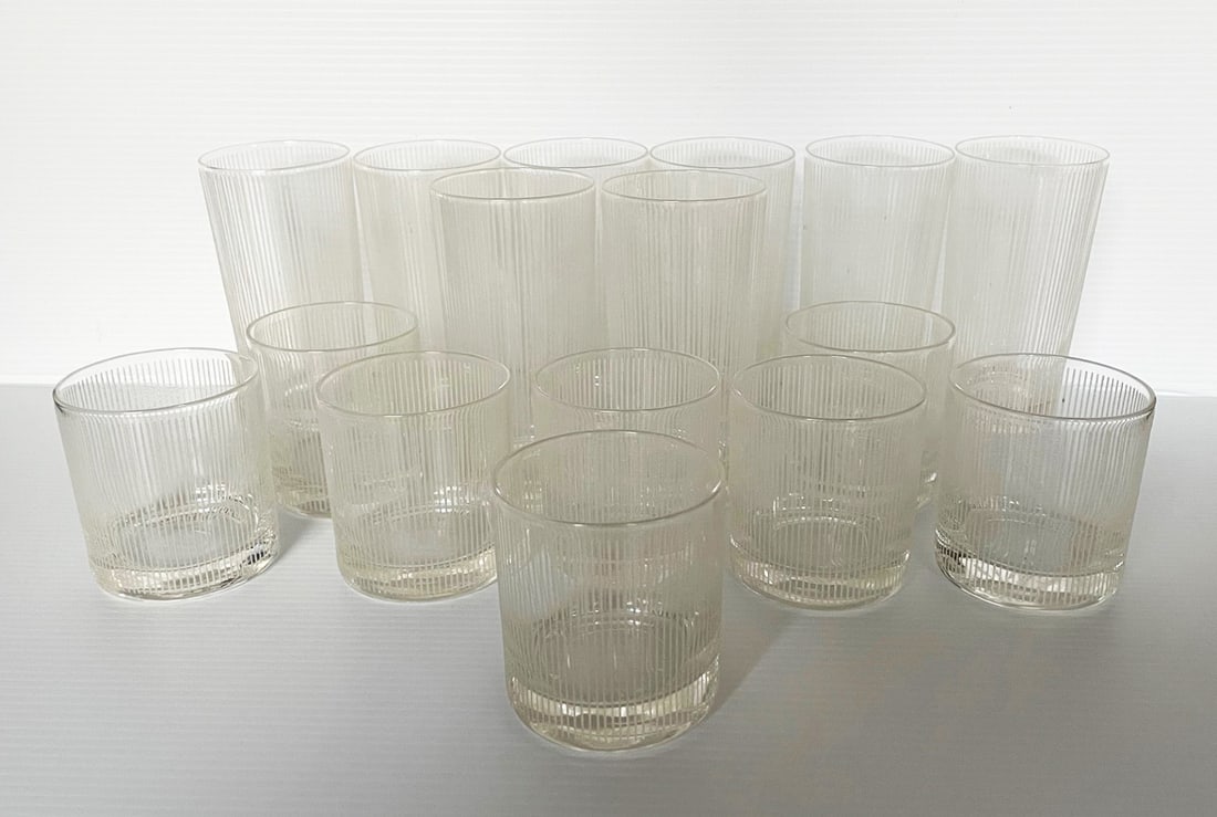 Set of Ribbed Glass Barware: Set of ribbed glass barware in two sizes, eight each, 3 1/4" high x 3" diameter, and 5 1/2" high x 2 3/4" diameter, unmarked