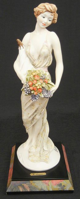 Giuseppe Armani figurine Lady holding a bouquet of flow: Giuseppe Armani figurine Lady holding a bouquet of flowers, signed on back, mounted on base with name plaque, 14 1/4" high