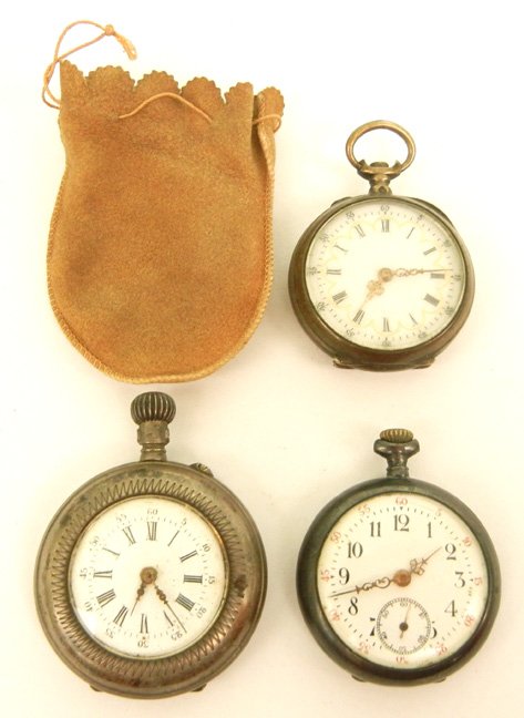 Three small lady's silver pocket watches including one : Three small lady's silver pocket watches including one with porcelain face, Roman numeral dial, gold hands, engraved flower basket motif on back of case, European hallmark, 1 1/8" in diameter, one wit