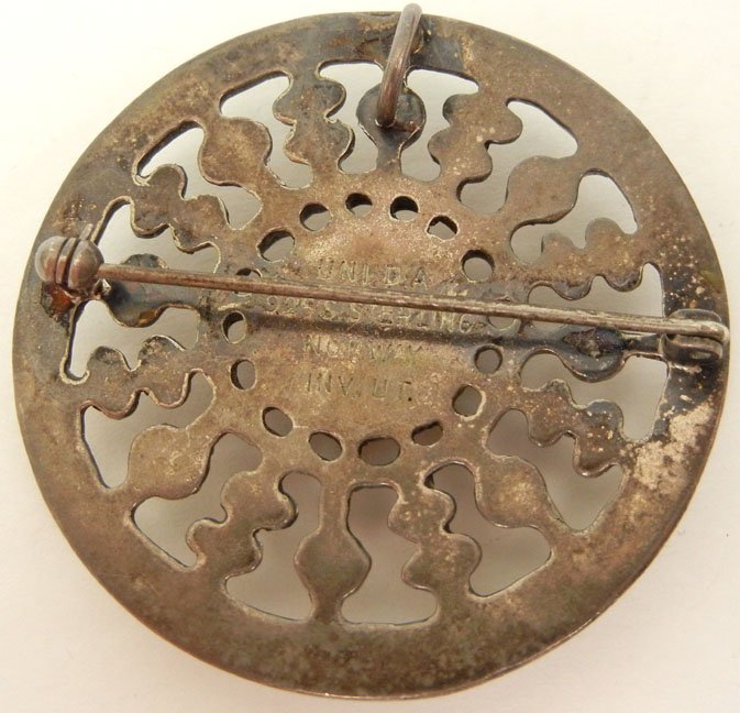 Two Scandinavian modern sterling silver pins including  - 3
