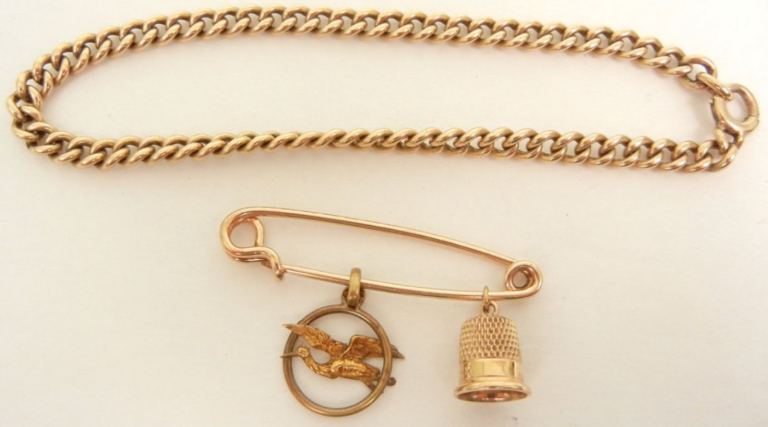Gold charm bracelet, charm holder and charms, 14k rose 