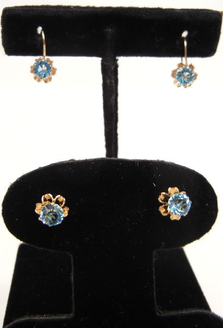Two pair of gold and blue topaz earrings, both 10k, one