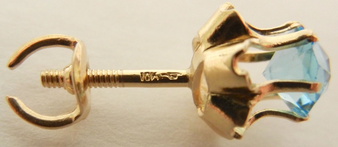 Two pair of gold and blue topaz earrings, both 10k, one - 4