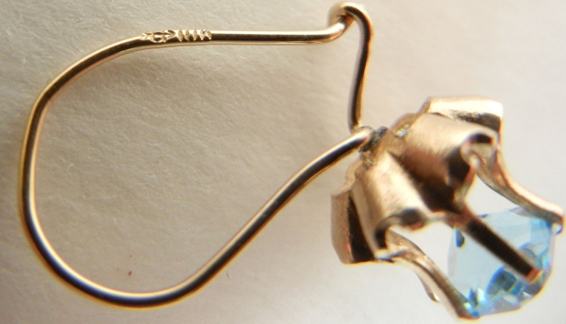 Two pair of gold and blue topaz earrings, both 10k, one - 5