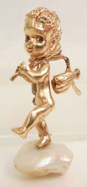 Gold and pearl cherub pin, 14k gold whimsical cherub ho: Gold and pearl cherub pin, 14k gold whimsical cherub holding knapsack, large freshwater pearl base, 1 5/8" high, blue stone eyes, marked 14k Copyright Ruser, weight 12.6 grams/8.1 dwt, mid 20th C.