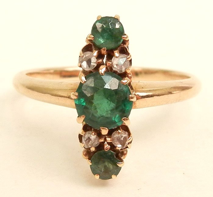 Edwardian gold, emerald and diamond ring, 10k rose gold: Edwardian gold, emerald and diamond ring, 10k rose gold, set with three round emeralds (possible synthetic), center stone is 5mm in diameter, with two smaller stones approximately 2mm in diameter, fou