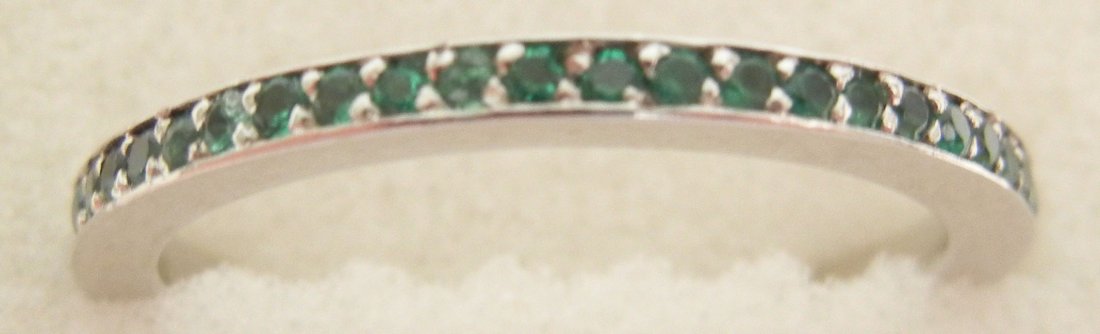 Emerald and platinum eternity band, set with forty nine - 2