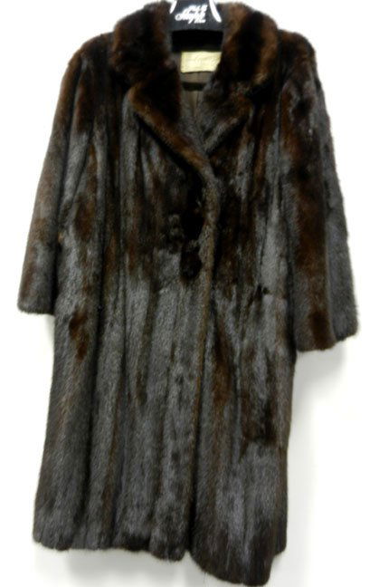 Full length brown mink coat, size medium, 20" across bu: Full length brown mink coat, size medium, 20" across bust, 21 1/2" from shoulder to cuff and 40" long from collar to hem, three mink covered buttons, belt across back, label from Eugene Gewurz, Furs o