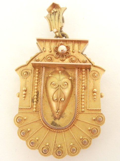 Gold Etruscan Revival Victorian locket, 10k gold with h: Gold Etruscan Revival Victorian locket, 10k gold with high carat gold wash, 2 1/8" long, oval compartment for hair or photo 7/8" long x 5/8" wide, has frame and glass, unmarked, tests 10k, weight 13.9