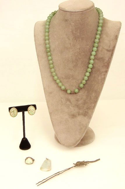 Chinese jade and silver grouping includes beaded neckla: Chinese jade and silver grouping includes beaded necklace, 9mm beads, silver filigree accent beads, 24" long; carved jade pendant, 1 1/2" long, gold filled bale; carved jade Buddha in handmade silver