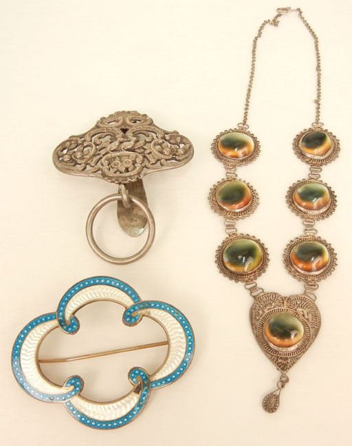 Silver jewelry grouping includes Victorian sterling sil: Silver jewelry grouping includes Victorian sterling silver chatelaine hook, floral motif with birds, 3 1/4" long, hallmarked, tests silver, ca. 1890; sea snail necklace in silver filigree mountings, 1