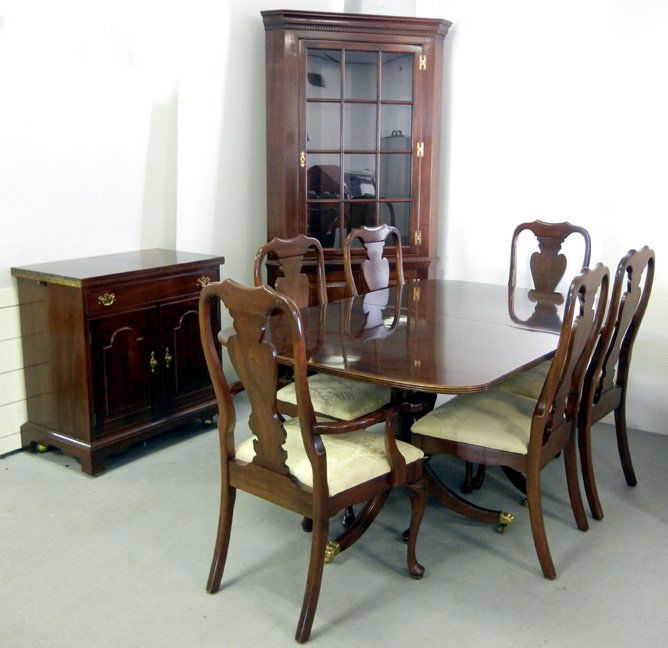 Stickley Queen Anne style cherry dining room suite, ta: Stickley Queen Anne style cherry dining room suite, table has brass paw feet on casters, 30 1/4" high x 68" x 44", two 15" leaves, four side chairs 41 3/4" high, two armchairs 42" high, lighted corner