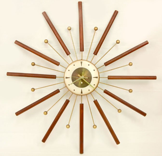 Junghans quartz sunburst clock, mid 20th C., 28 1/2" di: Junghans quartz sunburst clock, mid 20th C., 28 1/2" diameter, working