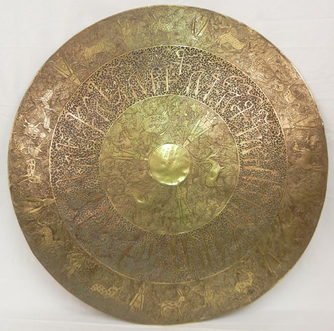 Persian brass house blessing, chased and pierced design: Persian brass house blessing, chased and pierced design with figures and animals, 29" diameter, 19th C.