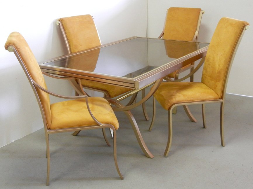 Design Institute America five piece steel dining room s: Design Institute America five piece steel dining room set including dual glass top extension table and four chairs, table measures 29" x 60" x 40" (closed) 120" (extended), chairs 41" high