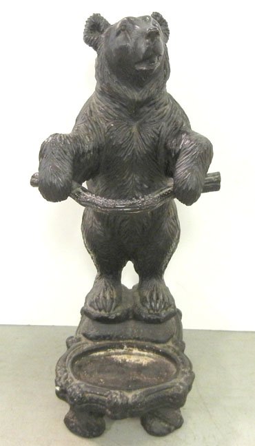 German Black Forest carved umbrella stand, standing bea: German Black Forest carved umbrella stand, standing bear holding branch, late 19th to early 20th C., 30" high