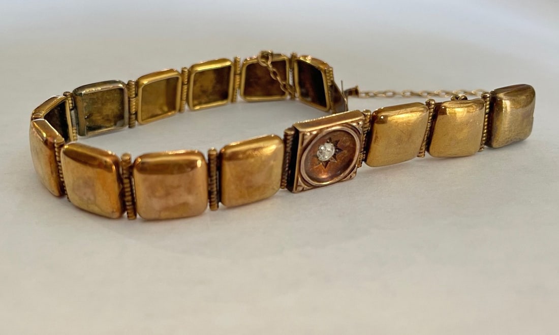 Victorian 14k Rose Gold Button Bracelet: Victorian 14k rose gold button bracelet, hinged square sections, 6 3/4" long x 7/16" wide, one link is set with round diamond measuring approximately 0.15 carats, one link with monogram, unmarked,