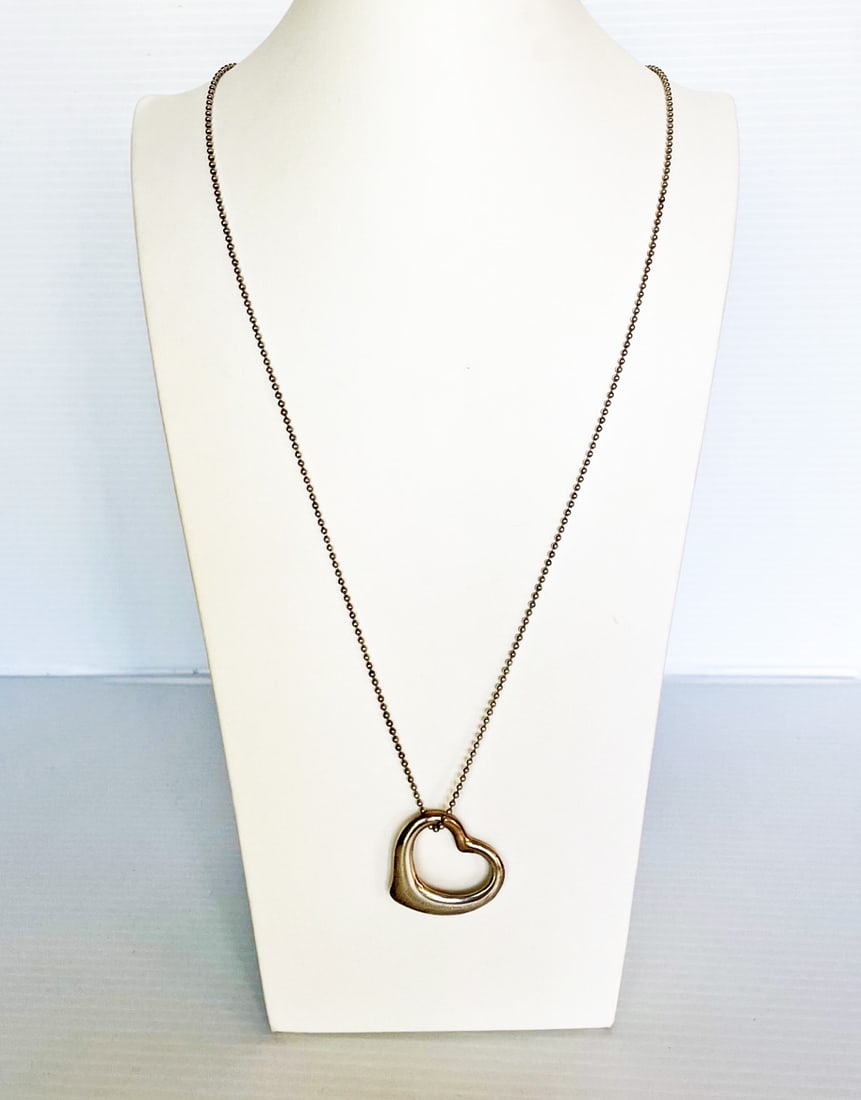 Tiffany & Co. Sterling Silver Elsa Peretti Heart Pendant: Tiffany & Co. sterling silver Elsa Peretti heart pendant, large floating heart, 1-38' long, signed Tiffany & Co. Elsa Peretti 925 Spain, 29" long bead chain stamped Italy 925, weight 24.6 grams
