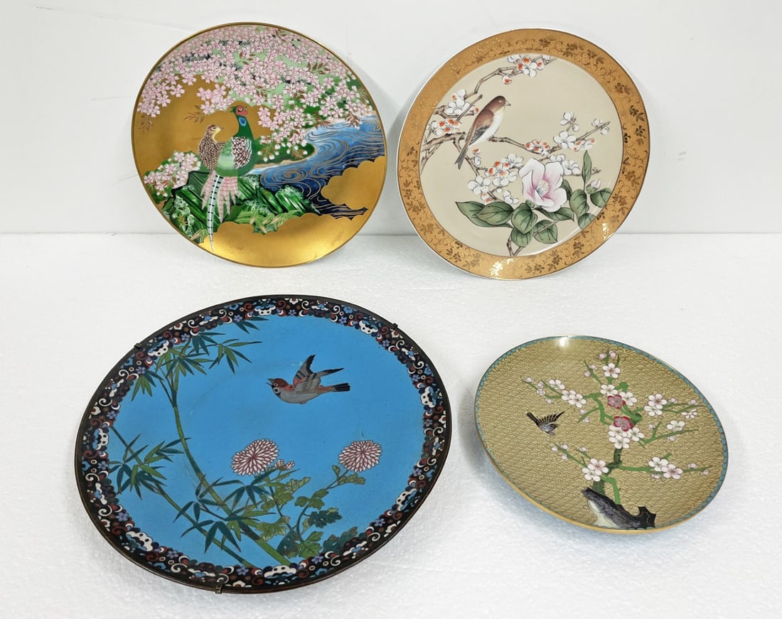 Four Asian Plates: Four Asian plates, includes cloisonne enameled plate depicting a bird and floral motifs, blue ground and reverse, wire wall hanger on bottom, 12" diameter, smaller cloisonne plate also with bird and f