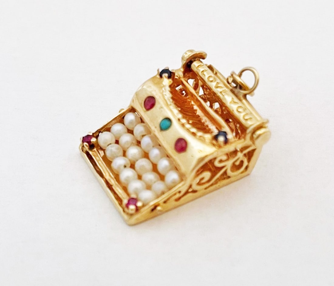 10K Gold Jeweled Typewriter Charm: 10k gold jeweled typewriter charm, handmade charm for bracelet, small pearl keys, and set with small sapphires, rubies and turquoise, says "I Love You", measures 7/8" x 3/4" x 3/8', unmarked, tests 10