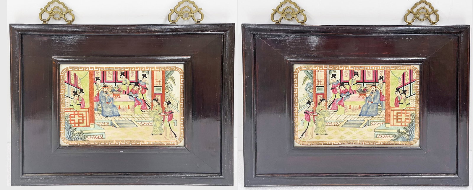Pair of Framed Asian Plaques: Pair of Framed Asian Plaques, hand painted figural scenes, sight measures 8 1/4" h x 11 1/2" w, frame measures 16" high (18 1/2" high to top of brass hardware) x 20 3/4" wide x 1" deep