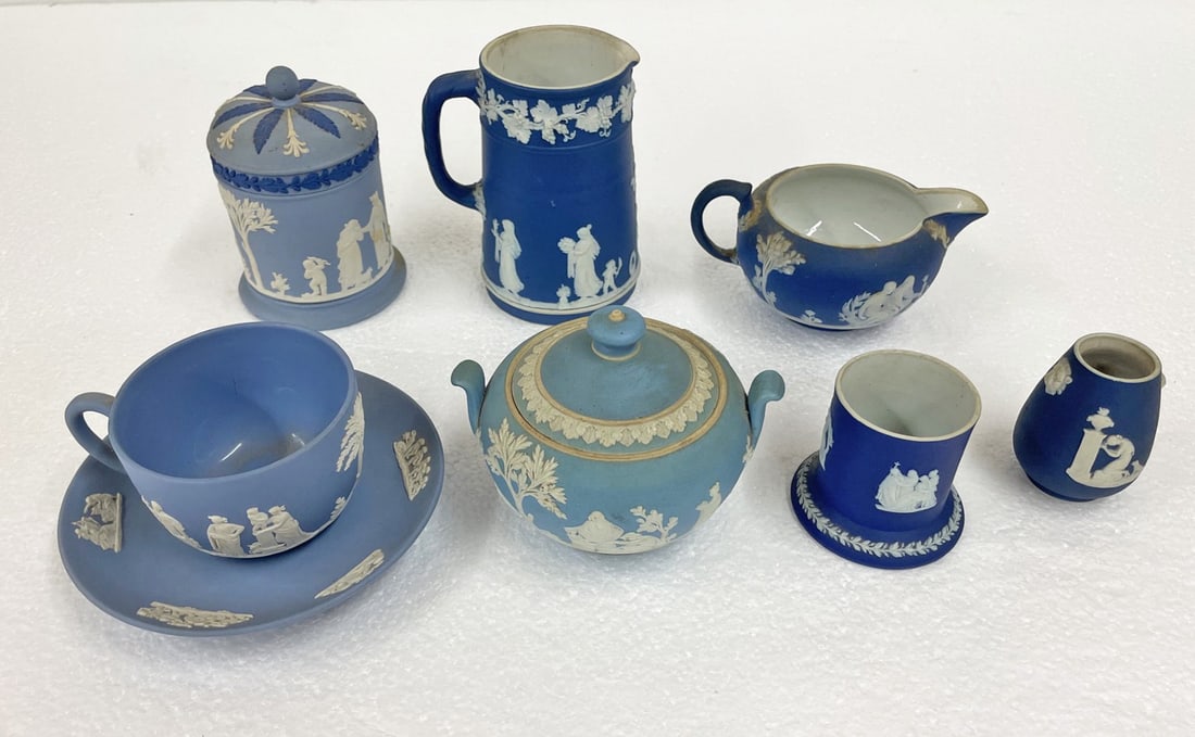 Collection of Wedgwood Jasperware: Collection of Wedgwood Jasperware, Neoclassical design, includes cobalt blue jasper dip, pitcher, creamer, and small vase, teacup and saucer, and a jasper dip handled covered sugar bowl, tricolor cove