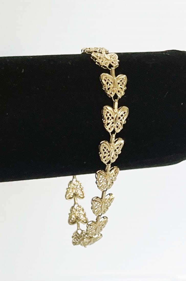 10k Gold Butterfly Link Bracelet: 10k gold butterfly link bracelet, 7.25" long x 3/8" wide, stamped 10k, weight 5.2 grams