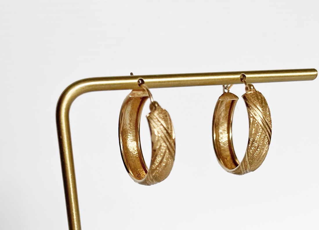 10k Gold Diamond Cut Hoop Earrings: 10k gold diamond cut hoop earrings, 7/8" long x 1/4" wide, stamped 10k, weight 2.4 grams
