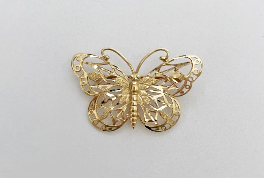 14k Gold Filigree Butterfly Brooch: 14k gold filigree butterfly brooch, diamond cut finish, 1 3/8' wide, stamped 14k, weight 3.1 grams