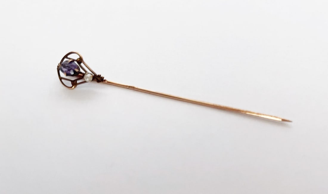 Edwardian 10k Rose Gold Stick Pin: Edwardian 10k rose gold stick pin, set with oval faceted amethyst and seed pearl, 2.5" long, unmarked, tests 10k, weight 1.0 grams