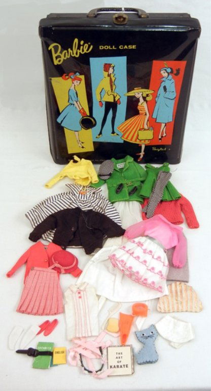 1961 Barbie doll case with rare Francie and Skipper: 1961 Barbie doll case with rare Francie and Skipper outfits, with some accessories, most outfits are tagged, in a Ponytail Barbie doll case, case measures 13" high x 11" across x 2 3/4" deep