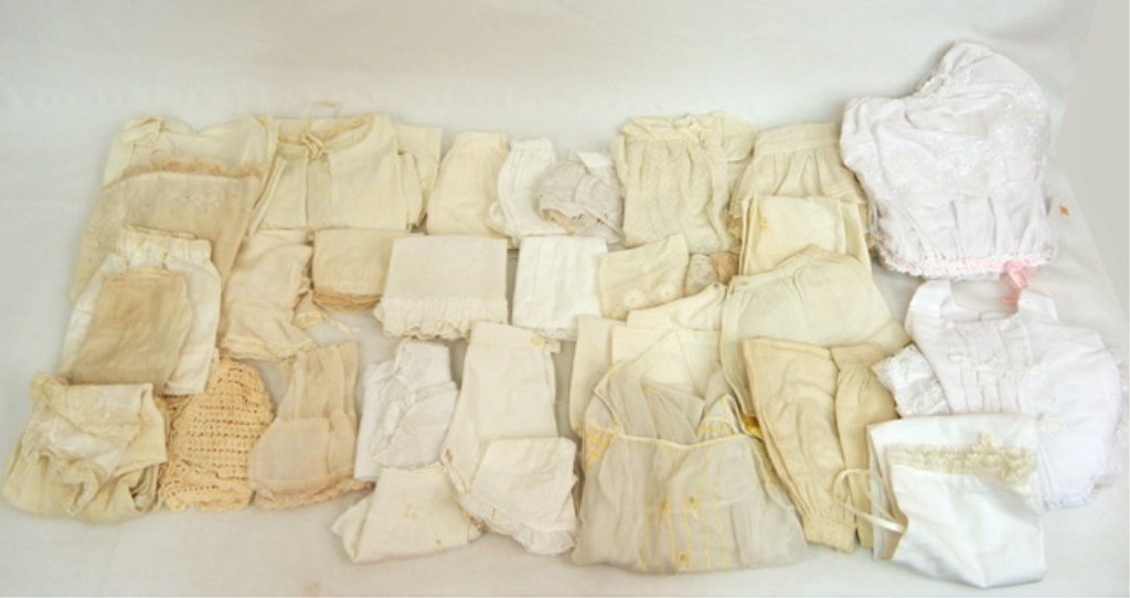 Vintage and antique doll whites, all sizes, including: Vintage and antique doll whites, all sizes, including platoons, slips, few dresses, and more